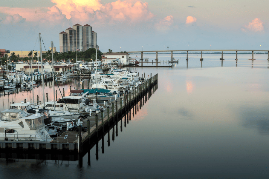 waterfront view of Downtown Fort Myers, FL during sunset