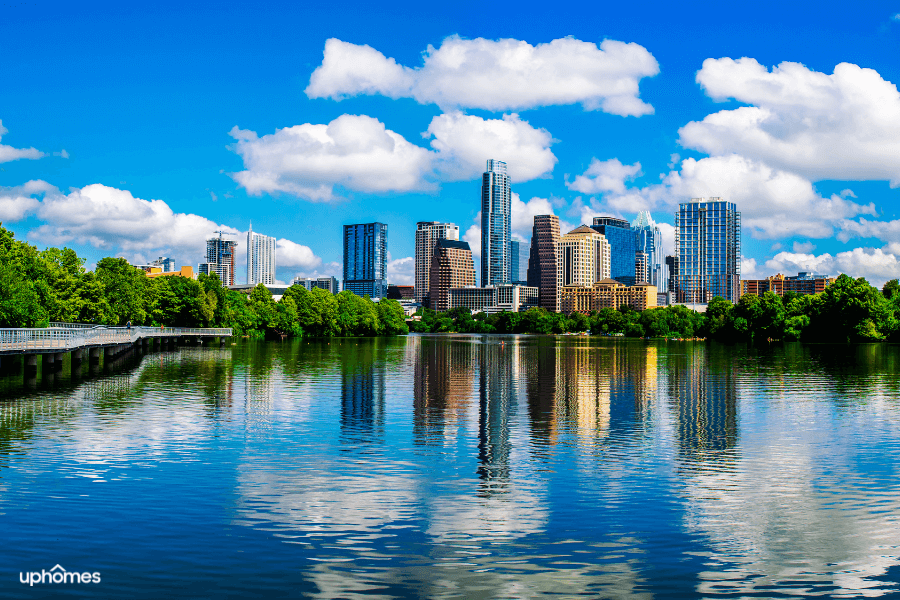 Austin Texas skyline of downtown and with water in the foreground on a sunny day