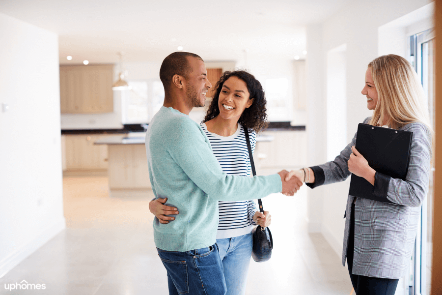 Home search with a newly wed couple and a Realtor helping them to find a home