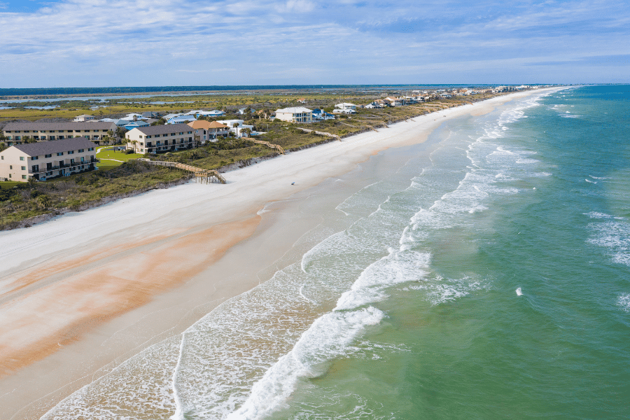 Crescent Beach aerial view of blue water and beach houses