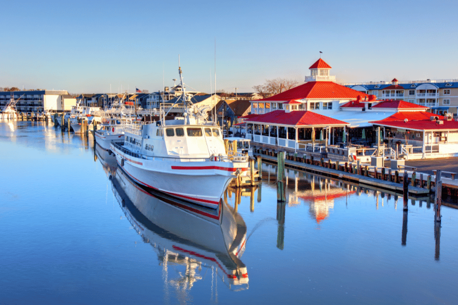 lewes-de-boardwalk-with-boat-and-restaurant.png Lewes DE Boardwalk with boats and Restaurant