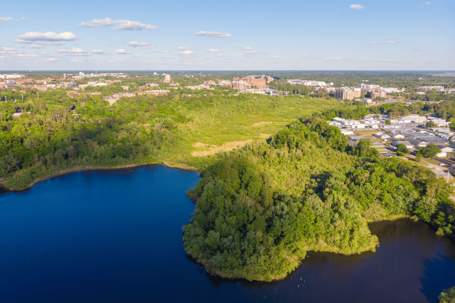Gainesville Aerial Aerial view of Gainesville, FL surrounded by the water and greenery